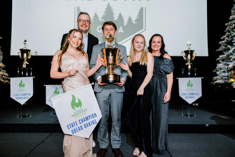 Award winners with trophies